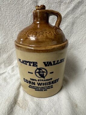 Platte Valley Corn Whiskey Stoneware Jug - Brown & Cream. Empty